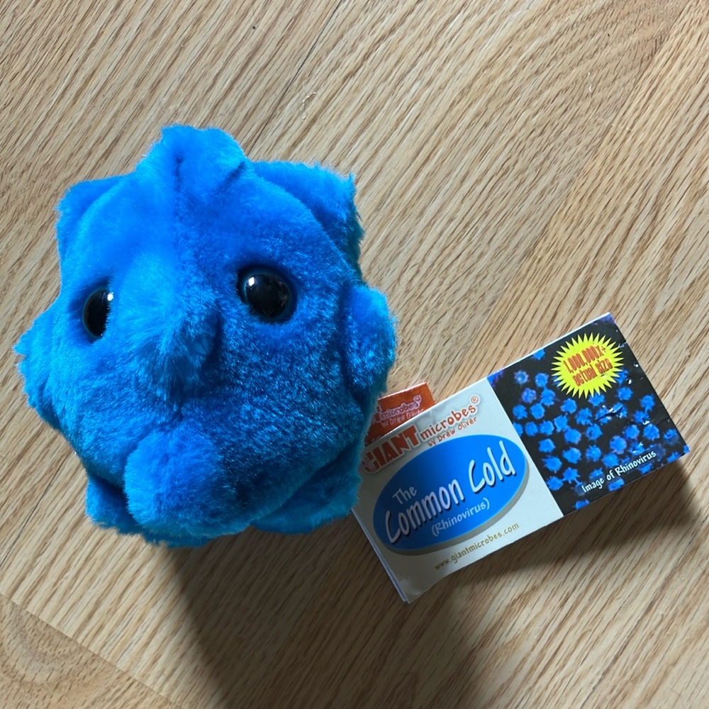 Vibrant Blue Microbe Plush Toy with Textural Accents
